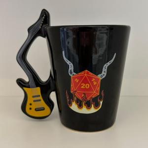 Caneca 3D Guitarra Cêramica 18,5x10,5 cm Preto predominante  Esmalte brilhante Suporta líquidos quentes ou frios e pode ir ao microondas